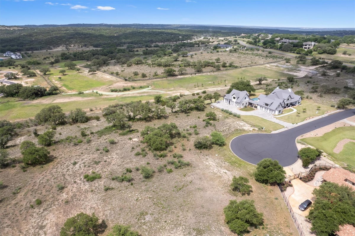 View 1117 Saddlebrook Cyn in Ranch At Lakeside Sec 01 1117 Saddlebrook Cyn - front exterior - Luxury lot in Ranch At Lakeside Sec 01, Spicewood, TX