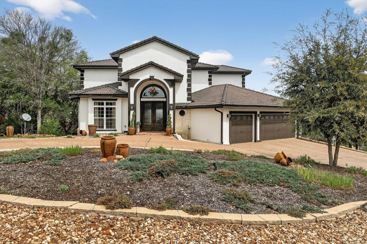 View 112 Big Sky DR in Horseshoe Bay West 112 Big Sky DR - front exterior - Luxury home in Horseshoe Bay West, Horseshoe Bay, TX