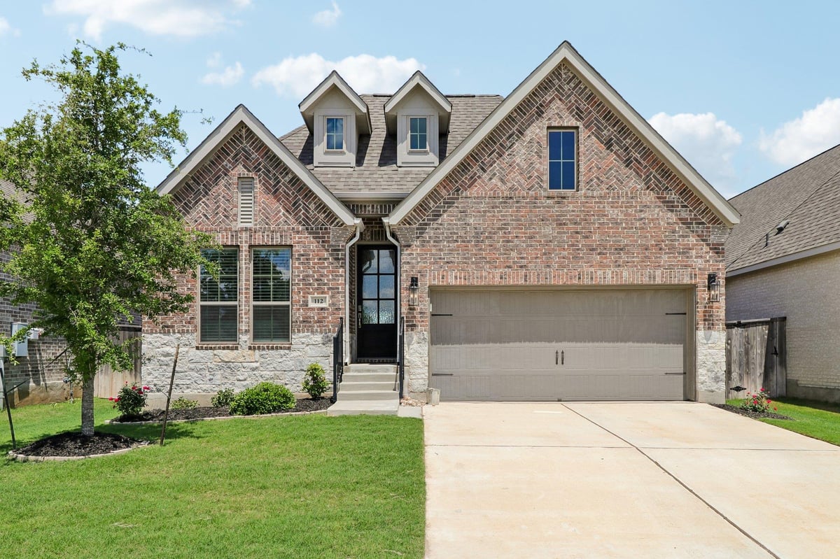 View 112 Chinaberry Bnd in Colony Mud 1B Sec 1 112 Chinaberry Bnd - front exterior - Luxury home in Colony Mud 1B Sec 1, Bastrop, TX