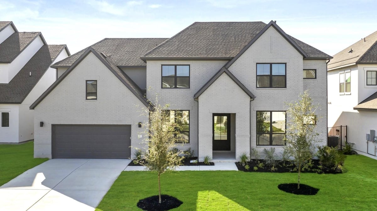 View 112 Irvine Pass in Toll Brothers at Santa Rita Ranch 112 Irvine Pass - front exterior - Luxury home in Toll Brothers at Santa Rita Ranch, Liberty Hill, TX