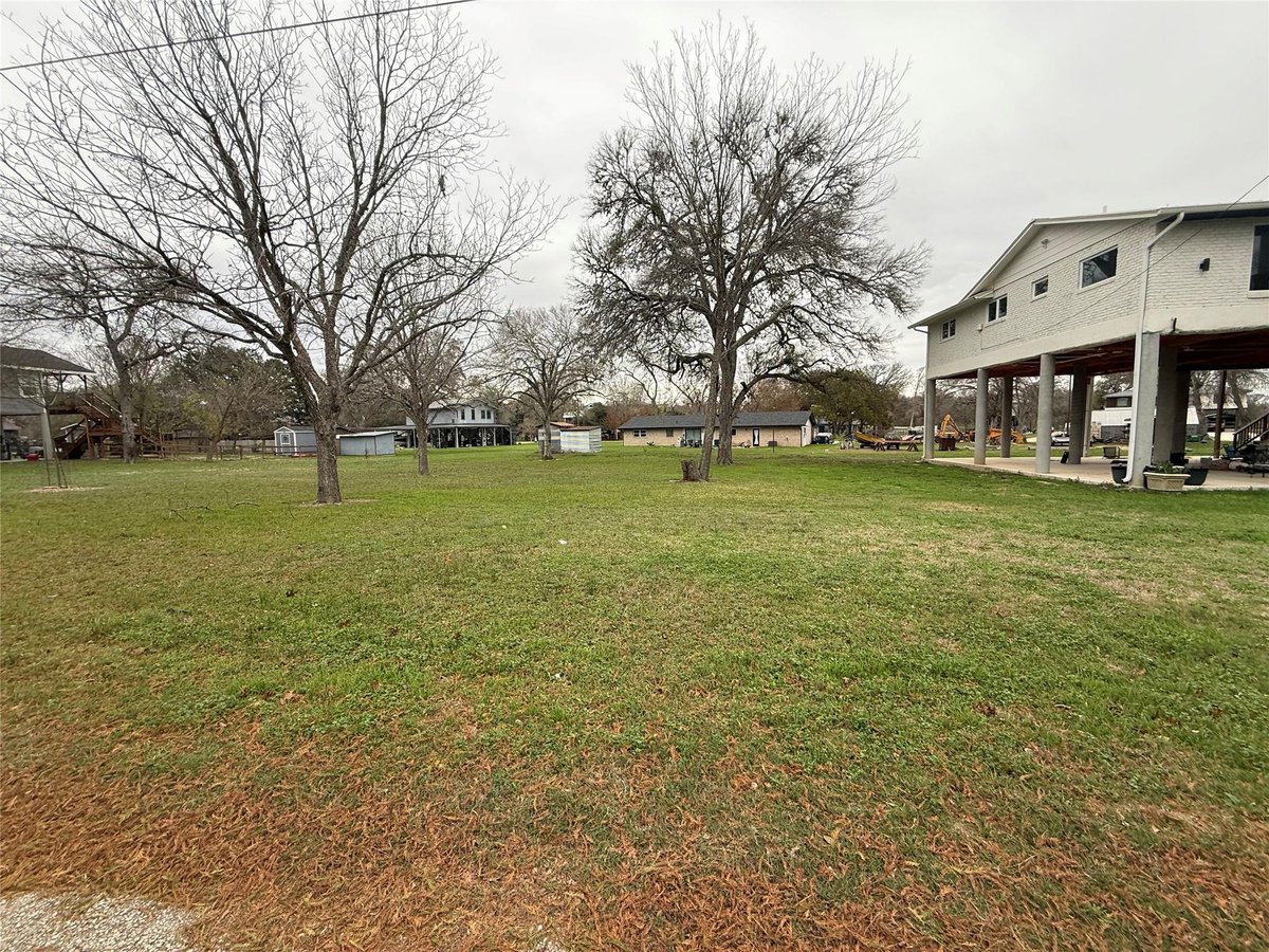 View 112 Lake Forrest Dr in Pecan Cove #1 112 Lake Forrest Dr - front exterior - Luxury lot in Pecan Cove #1, Seguin, TX