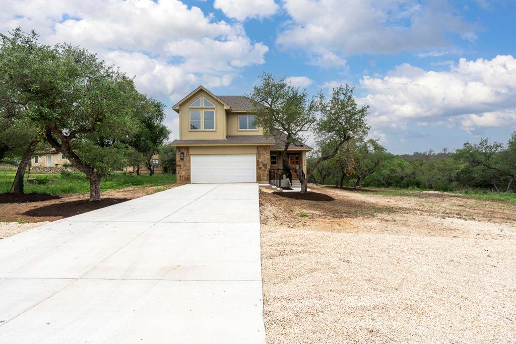 View 112 Twin Creek CIR in Hill Creek West 112 Twin Creek CIR - front exterior - Luxury home in Hill Creek West, Dripping Springs, TX