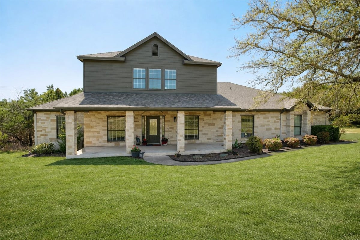 View 11201 W Cave Blvd in West Cave Estate Sec 1 11201 W Cave Blvd - front exterior - Luxury home in West Cave Estate Sec 1, Dripping Springs, TX