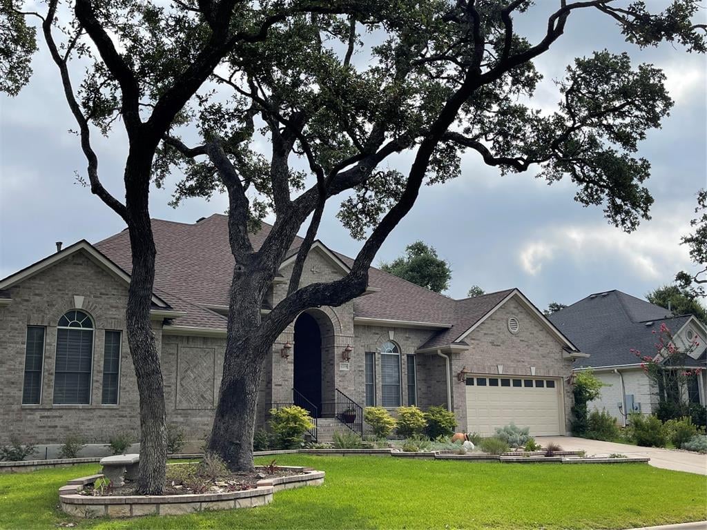 View 11208 Matisse Trl in Estates Brentwood 11208 Matisse Trl - front exterior - Luxury home in Estates Brentwood, Austin, TX