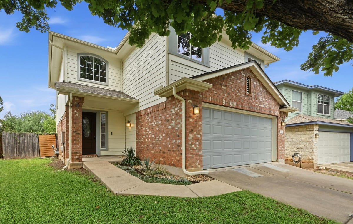 View 11213 Jim Thorpe Ln in Olympic Heights Sec 02 11213 Jim Thorpe Ln - front exterior - Luxury home in Olympic Heights Sec 02, Austin, TX