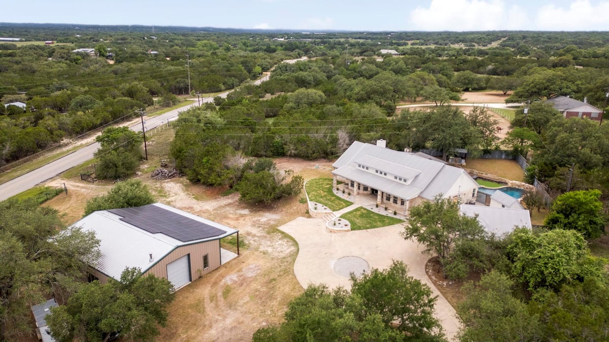 View 1129 Cedar Pass RD in Lanier Ranch Add Tr 01b-A 10 00 Ac Abst Id S46 1129 Cedar Pass RD - front exterior - Luxury home in Lanier Ranch Add Tr 01b-A 10 00 Ac Abst Id S46, Driftwood, TX
