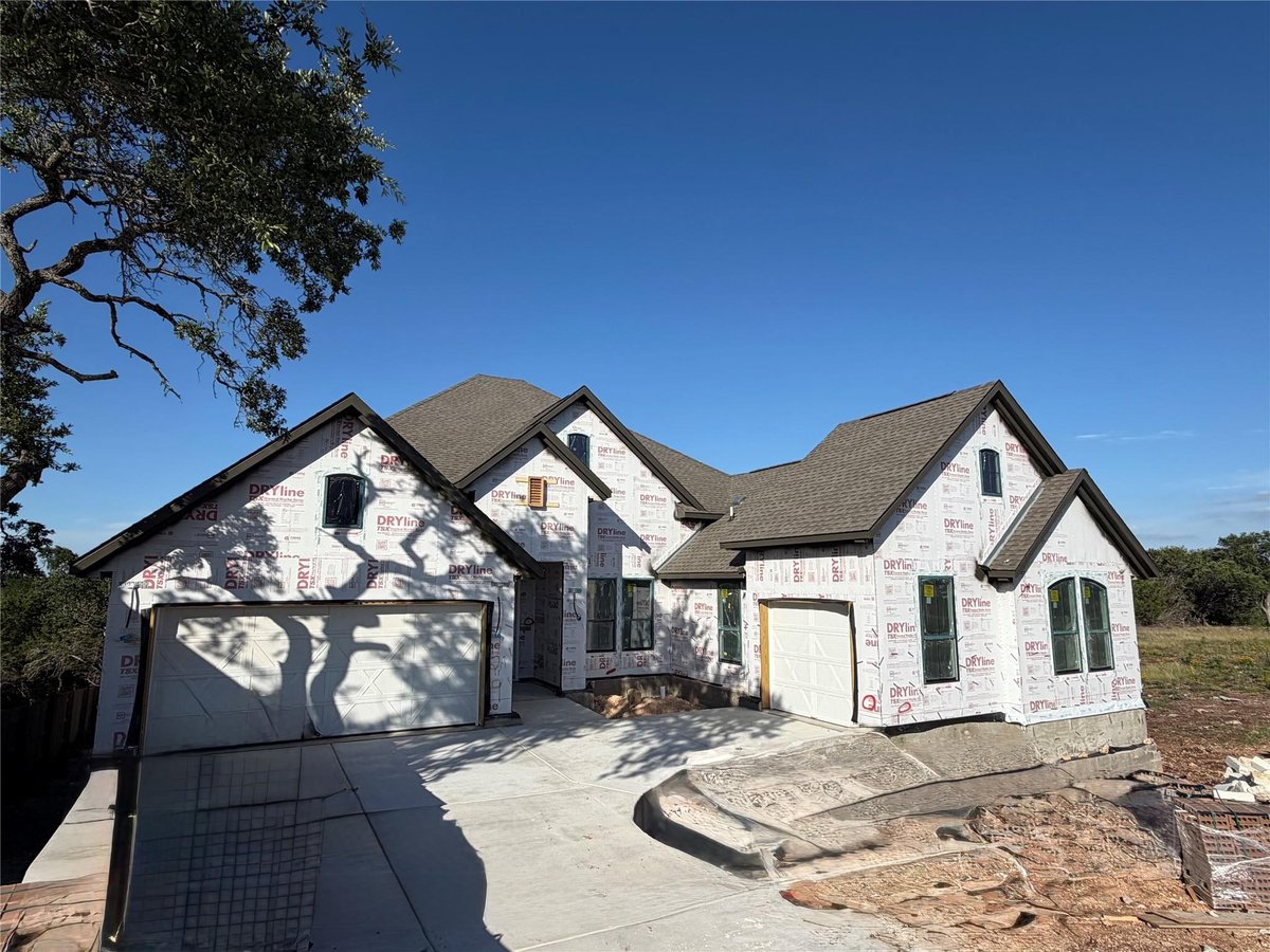 View 1129 Twisted Tarpley LN in Parkside on the River 1129 Twisted Tarpley LN - front exterior - Luxury home in Parkside on the River, Georgetown, TX