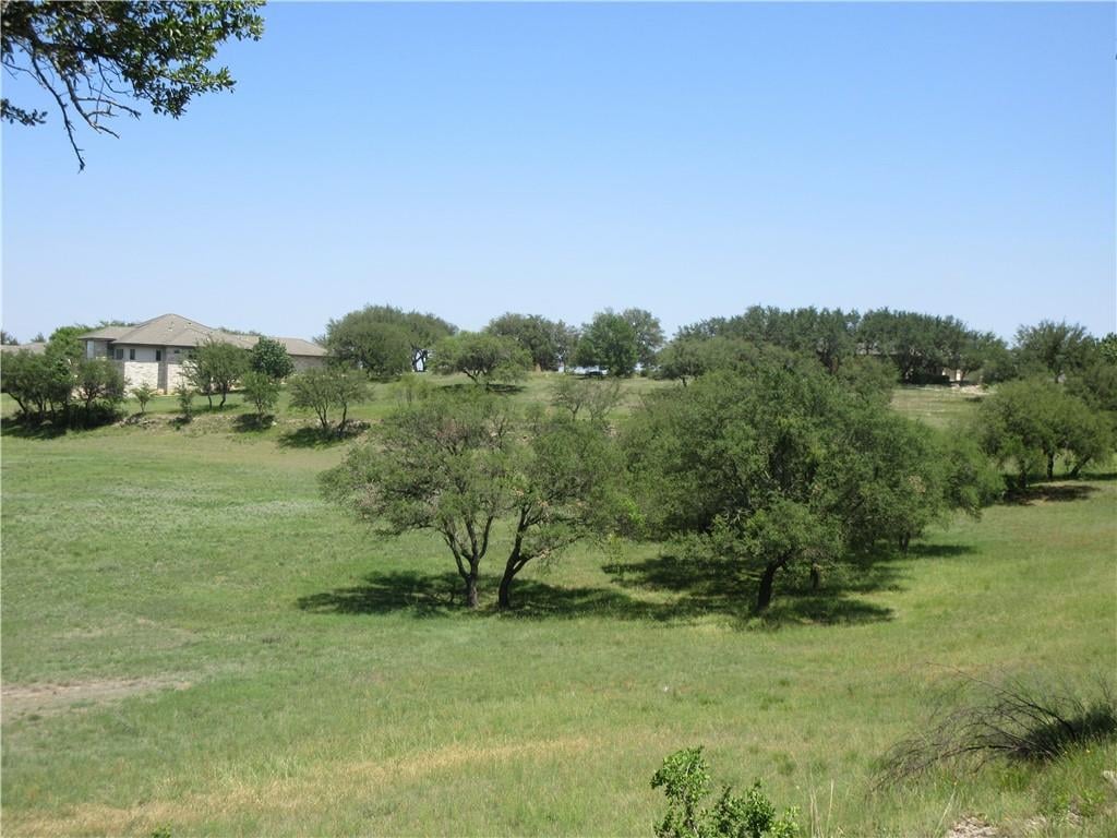 Primary bedroom at 113 Quail Pt - Barton Creek Lakeside, Spicewood, TX