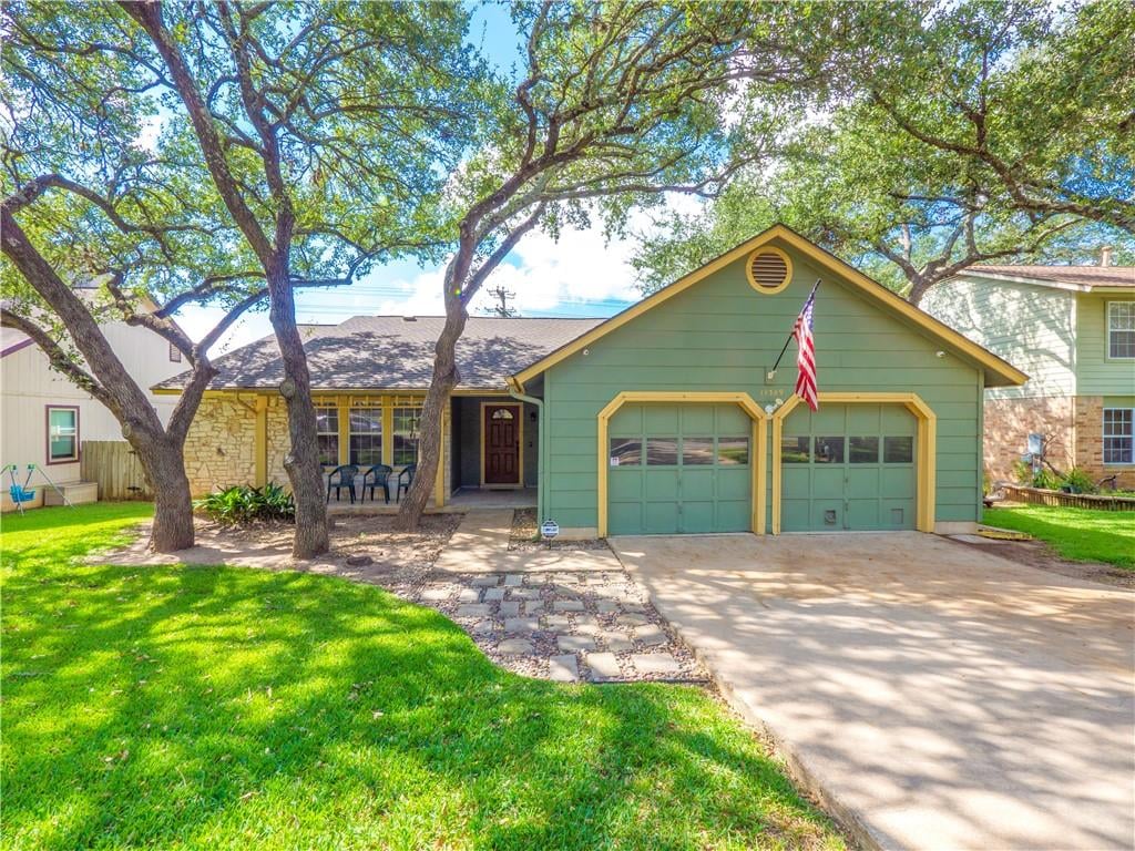11309 Morning Glory Trl - front exterior - Luxury home in Village Twenty One At Anderson, Austin, TX