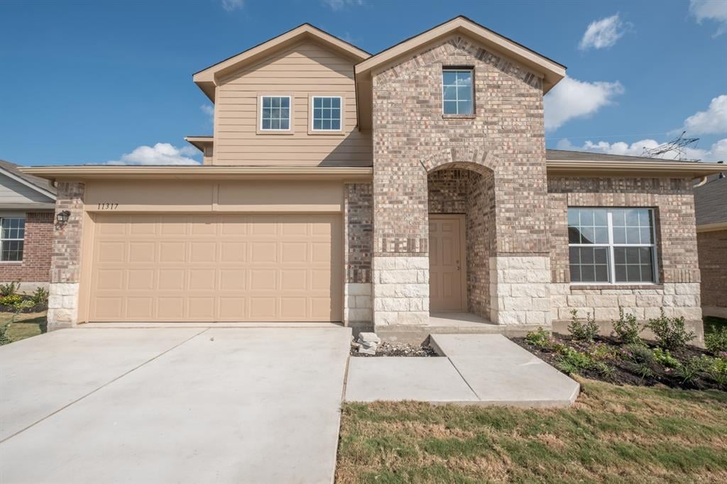 View 11317 Dawes Pl in PIONEER CROSSING WEST 11317 Dawes Pl - front exterior - Luxury home in PIONEER CROSSING WEST, Austin, TX