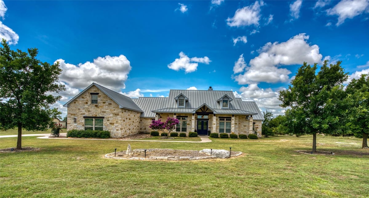 View 114 Big Sky in Eagles Nest 114 Big Sky - front exterior - Luxury home in Eagles Nest, Burnet, TX