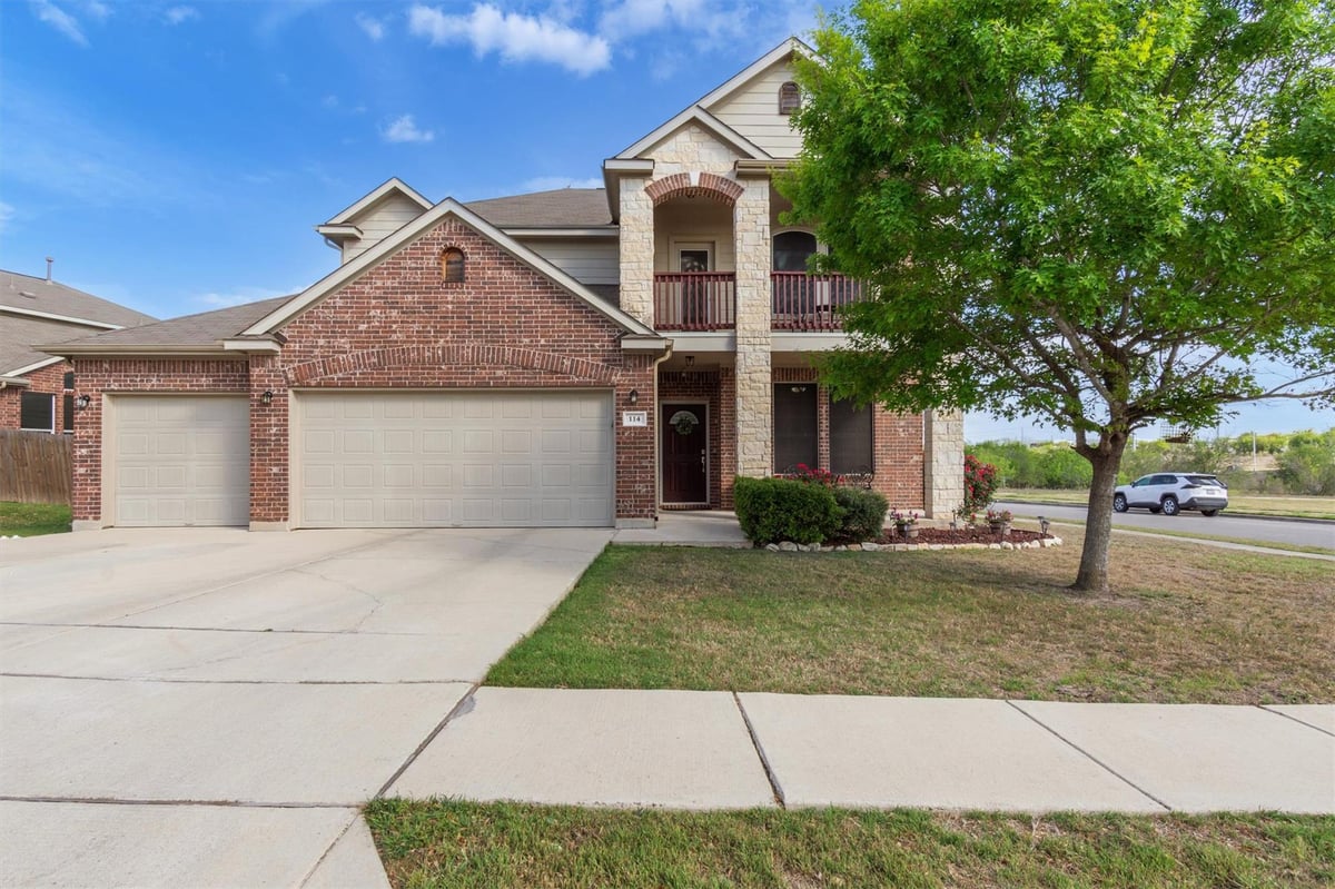 View 114 Hazy Sunshine Way in Sunfield Ph One Sec One 114 Hazy Sunshine Way - front exterior - Luxury home in Sunfield Ph One Sec One, Buda, TX