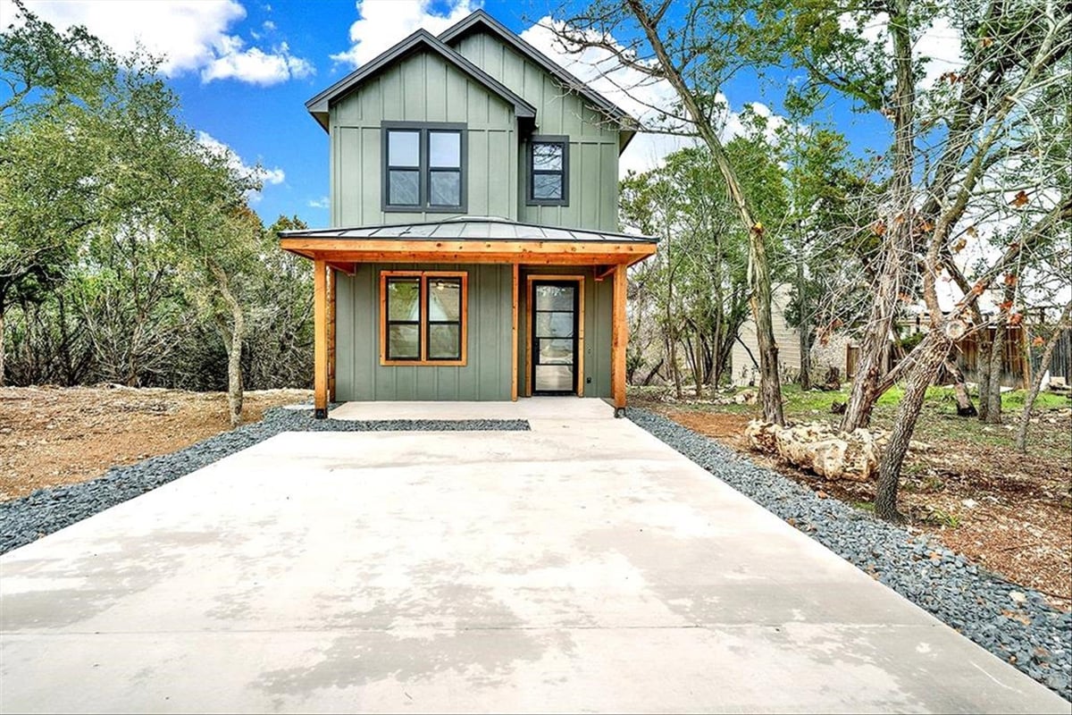 View 114 SHADY BLUFF Dr in WOODCREEK 114 SHADY BLUFF Dr - property photo 1 - Luxury home in WOODCREEK, Wimberley, TX