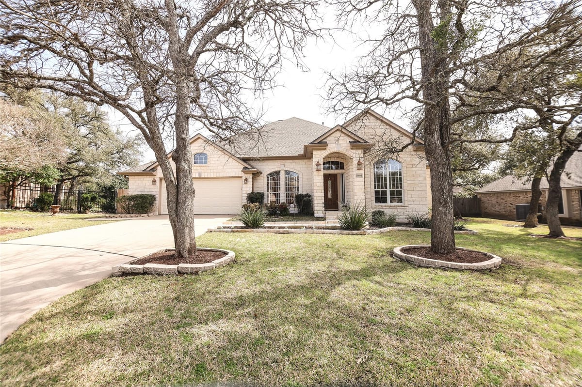View 11409 Monet Dr in Estates Brentwood 11409 Monet Dr - front exterior - Luxury home in Estates Brentwood, Austin, TX