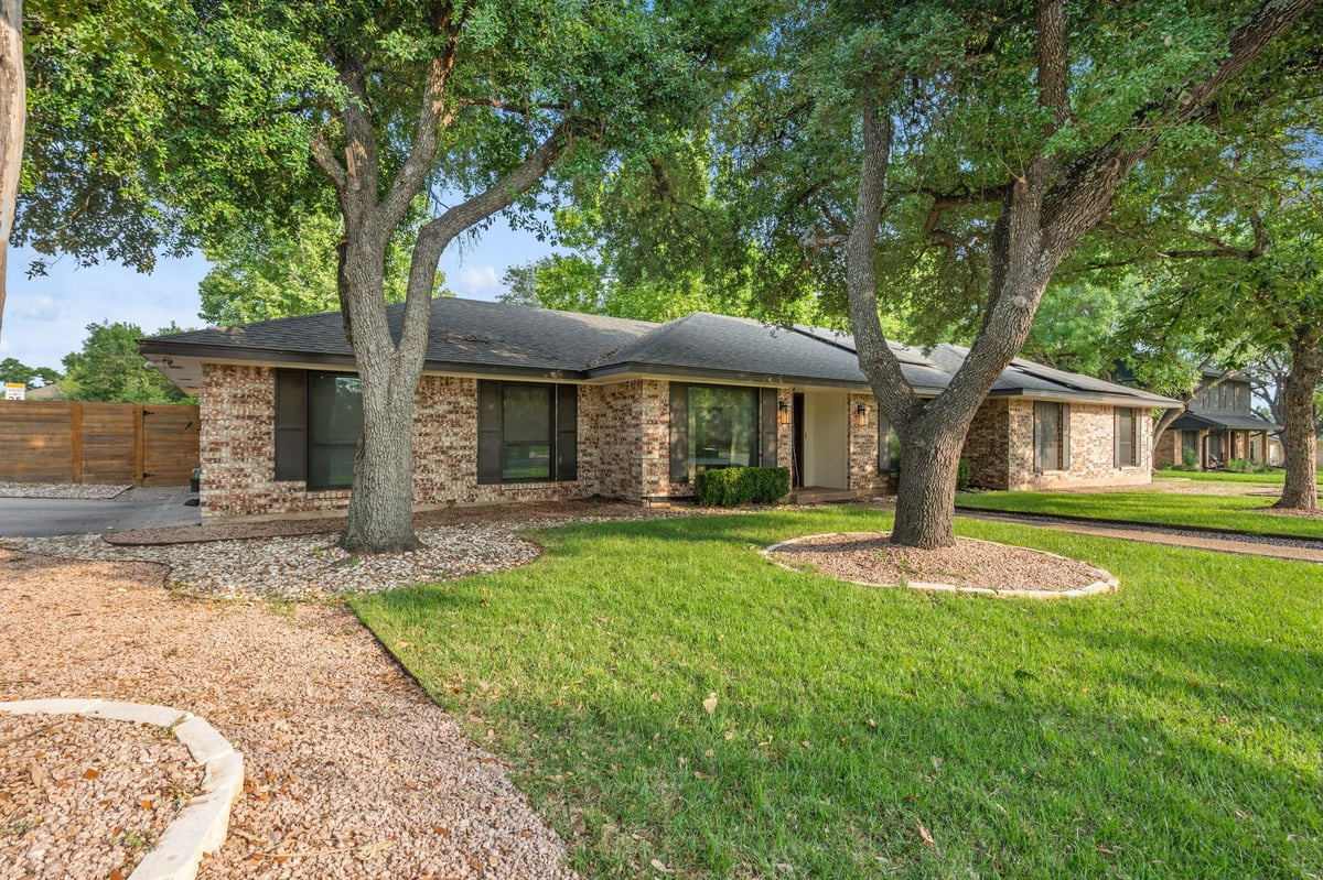 View 11409 Taterwood DR in Spicewood At Balcones Villages 11409 Taterwood DR - front exterior - Luxury home in Spicewood At Balcones Villages, Austin, TX