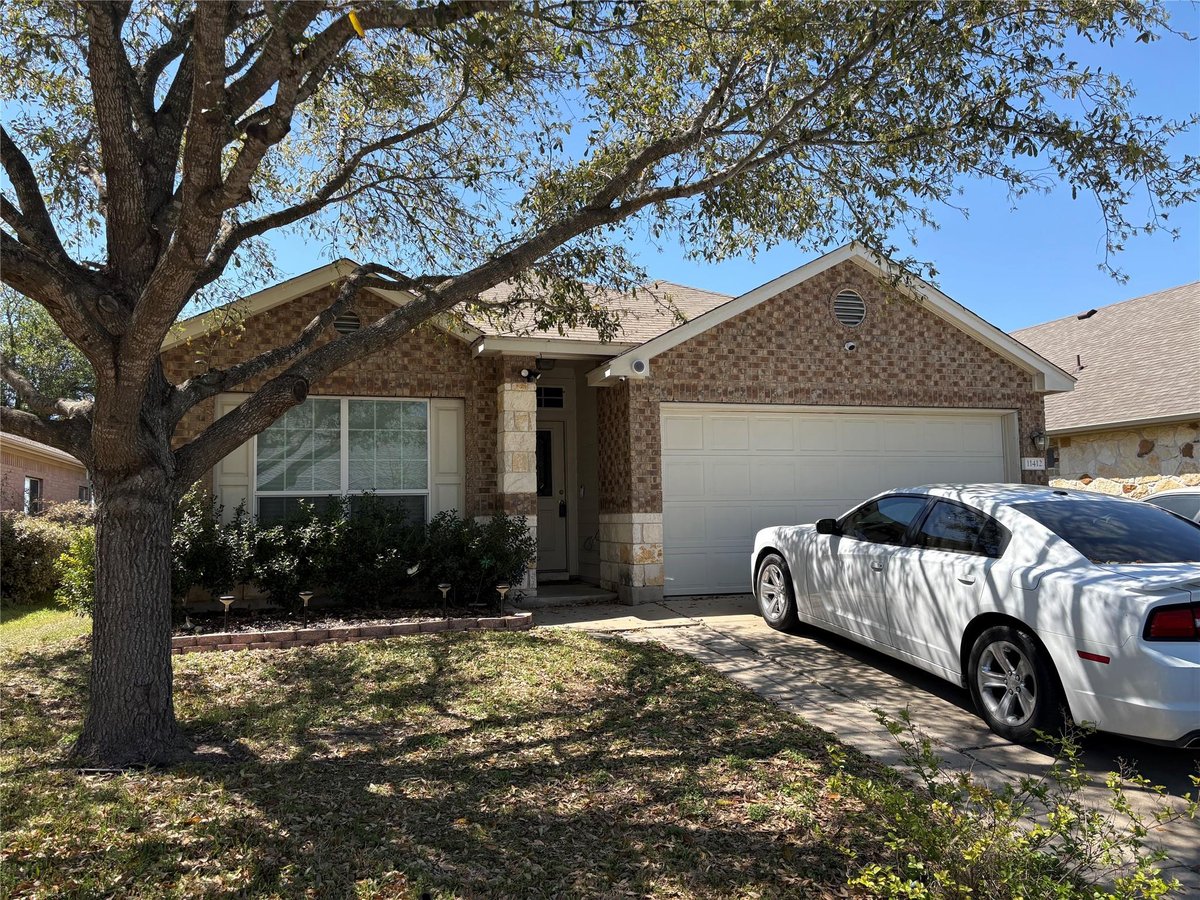 View 11412 Day Camp Ln in Pioneer Crossing West Sec 02 11412 Day Camp Ln - front exterior - Luxury home in Pioneer Crossing West Sec 02, Austin, TX
