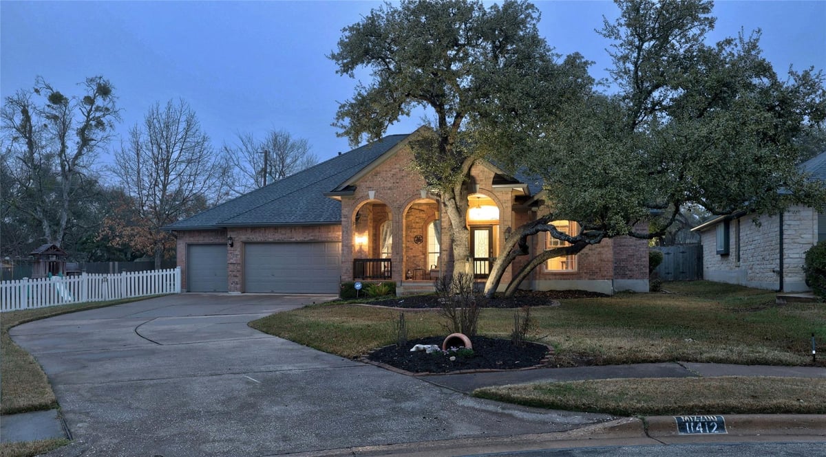 View 11412 Monet Dr in Estates Brentwood 11412 Monet Dr - front exterior - Luxury home in Estates Brentwood, Austin, TX
