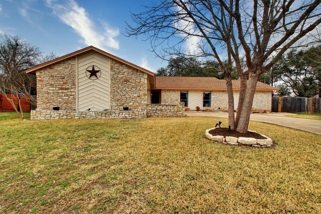 View 11412 Pyreneese Dr in Balcones Woods 11412 Pyreneese Dr - front exterior - Luxury home in Balcones Woods, Austin, TX