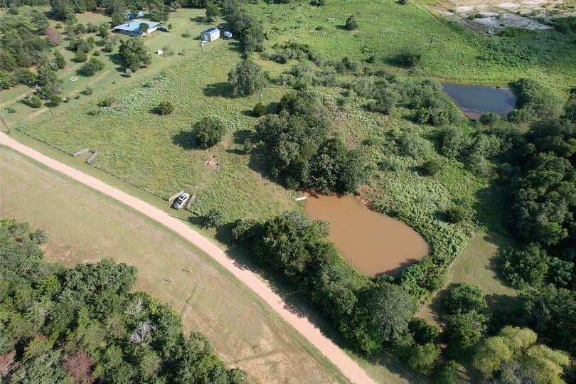 View 1142 Private Road 7039 in Fedor Estates Sec 3 1142 Private Road 7039 - front exterior - Luxury lot in Fedor Estates Sec 3, Lexington, TX