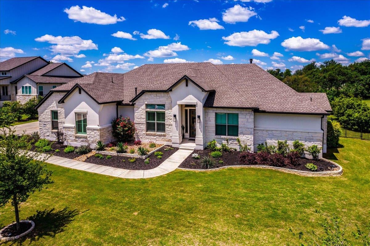 View 1144 Bunker Ranch Blvd in Bunker Ranch Ph 3 1144 Bunker Ranch Blvd - front exterior - Luxury home in Bunker Ranch Ph 3, Dripping Springs, TX