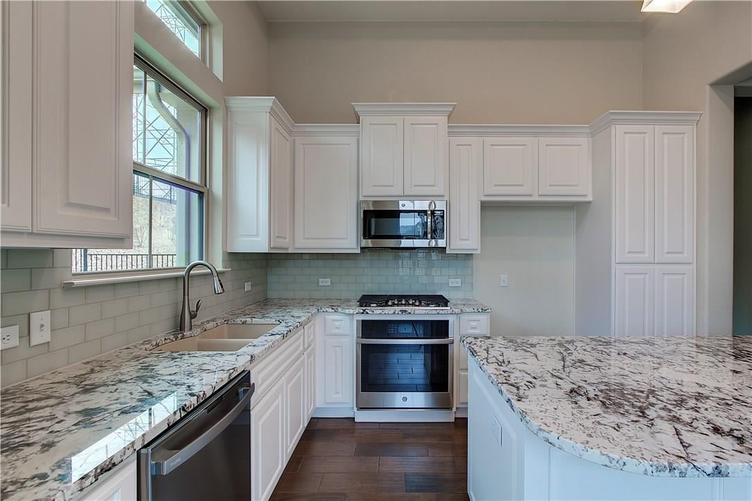 Primary bedroom at 115 Cartwheel Bnd - 3 bed 2 bath home