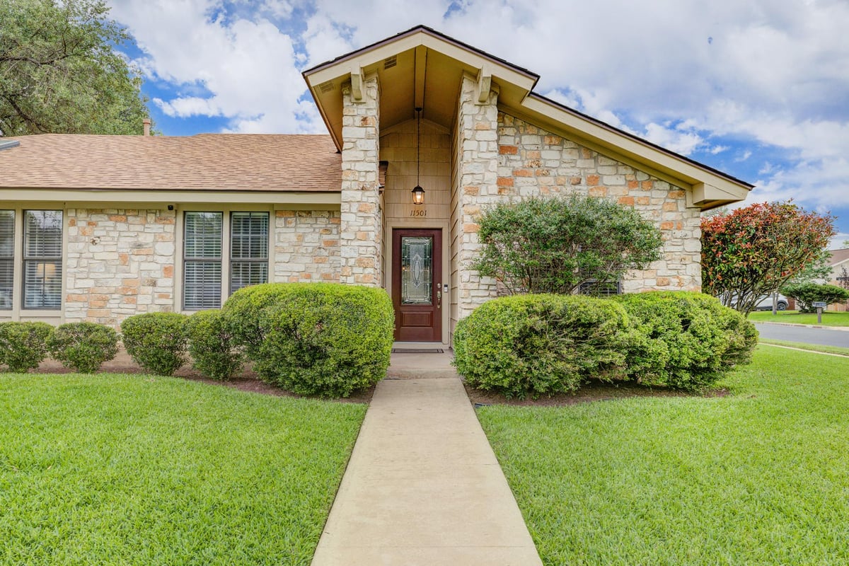 View 11501 D K Ranch Rd in Oak Forest Sec 05-A 11501 D K Ranch Rd - front exterior - Luxury home in Oak Forest Sec 05-A, Austin, TX