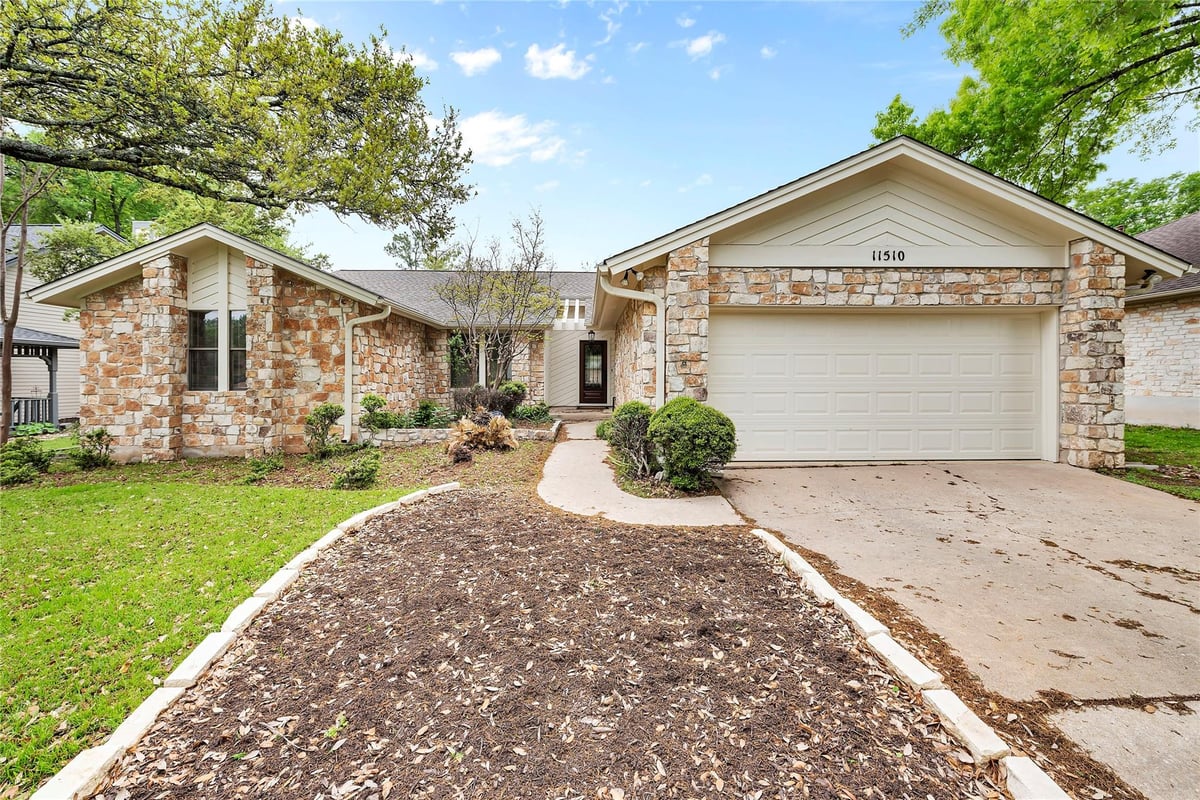 View 11510 Antigua Dr in Oak Forest Sec 05-A 11510 Antigua Dr - front exterior - Luxury home in Oak Forest Sec 05-A, Austin, TX