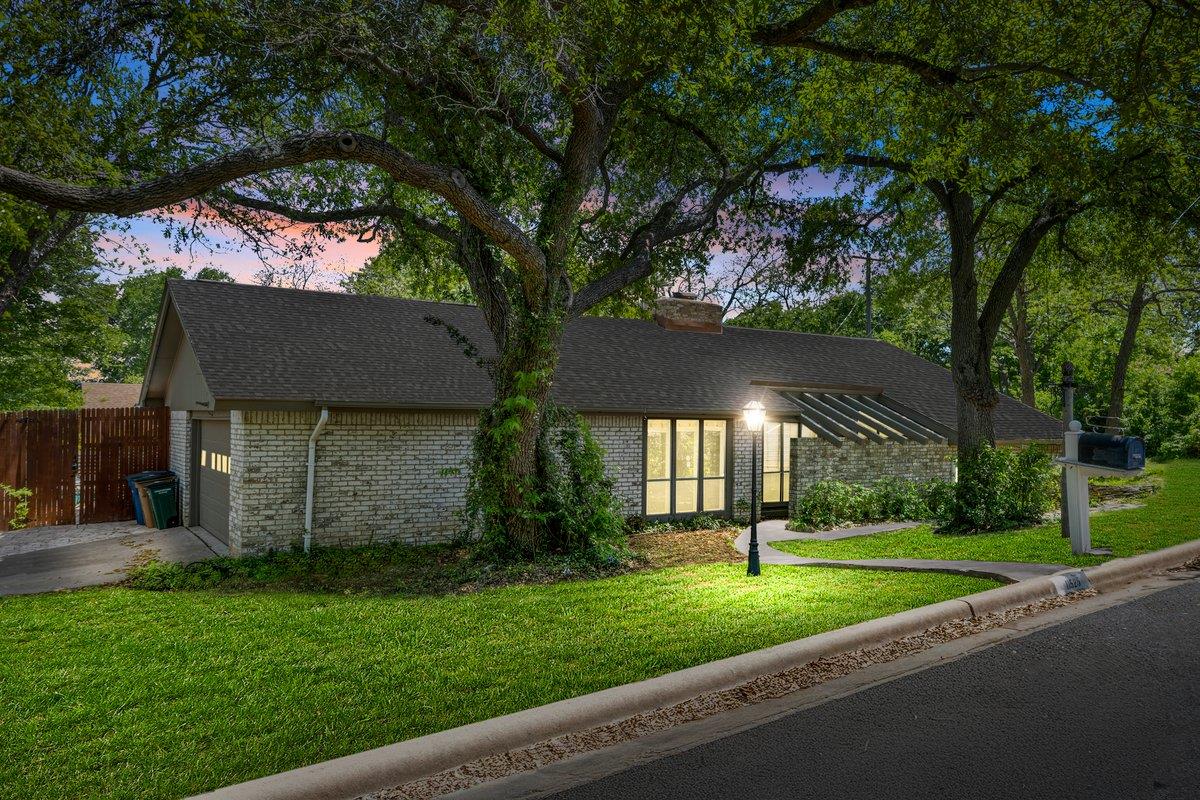 View 11525 Spring Hill DR in North Oaks Hillside Sec 02-A 11525 Spring Hill DR - front exterior - Luxury home in North Oaks Hillside Sec 02-A, Austin, TX