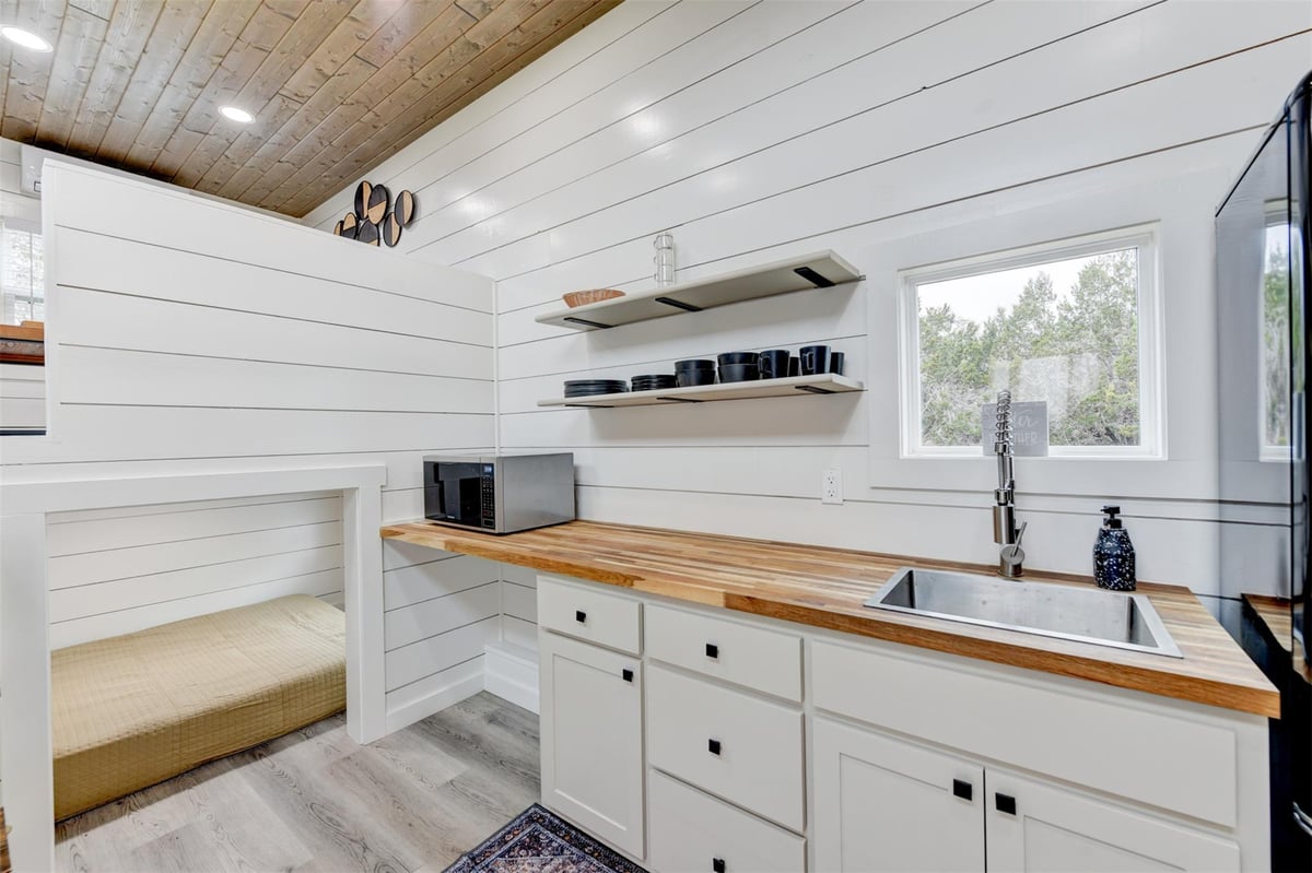 Primary bedroom at 1156 Narrows Rd - Forest View North, Blanco, TX
