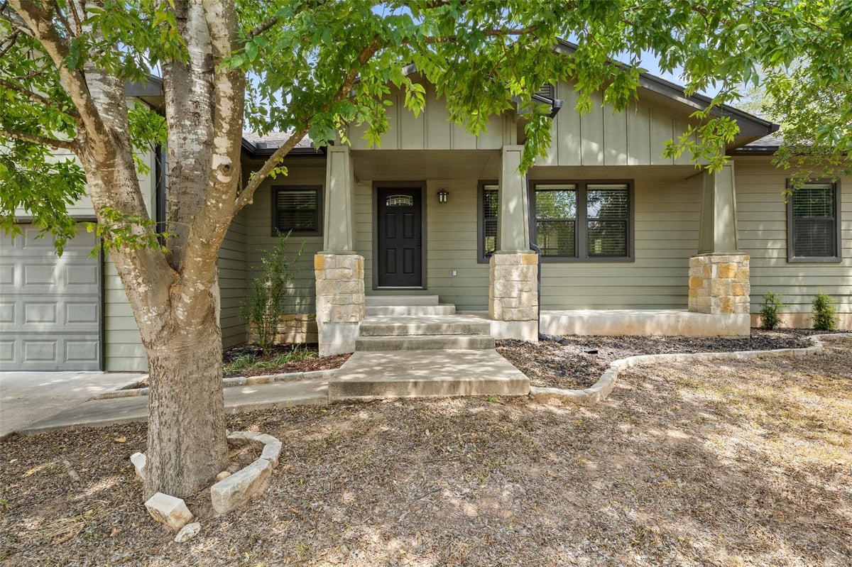 View 116 Laumaia LN in Tahitian Village, Unit 3 116 Laumaia LN - property photo 1 - Luxury home in Tahitian Village, Unit 3, Bastrop, TX
