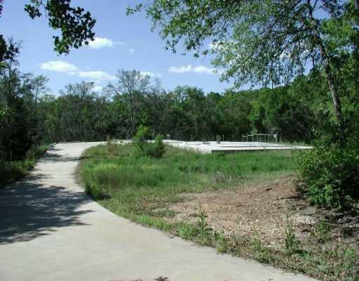 View 116 Piney Ridge DR 116 Piney Ridge DR - property photo 1 - Luxury lot in Bastrop, TX