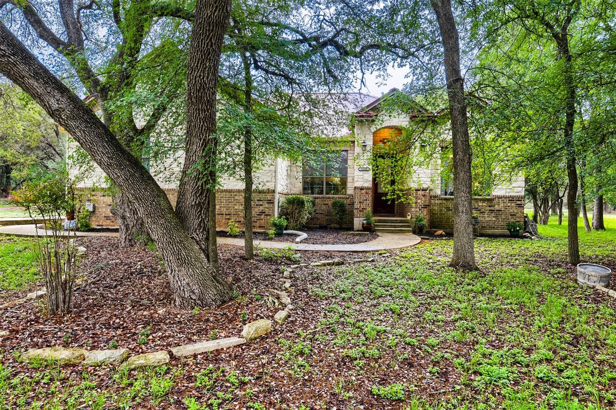 View 11600 Chapel Ln in San Leanna Estates 11600 Chapel Ln - front exterior - Luxury home in San Leanna Estates, Austin, TX