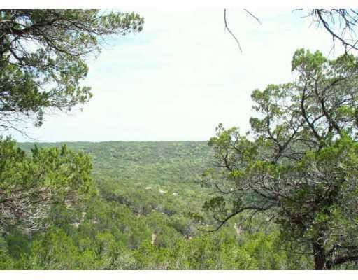 View 11611 Lime Creek RD 11611 Lime Creek RD - front exterior - Luxury lot in Volente, TX
