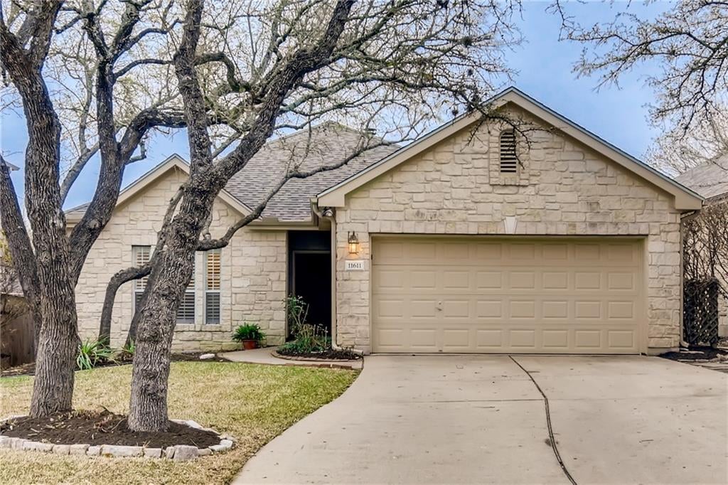 View 11611 Sonoma DR in Lake Pointe Sec 03 Ph 01 11611 Sonoma DR - front exterior - Luxury home in Lake Pointe Sec 03 Ph 01, Austin, TX