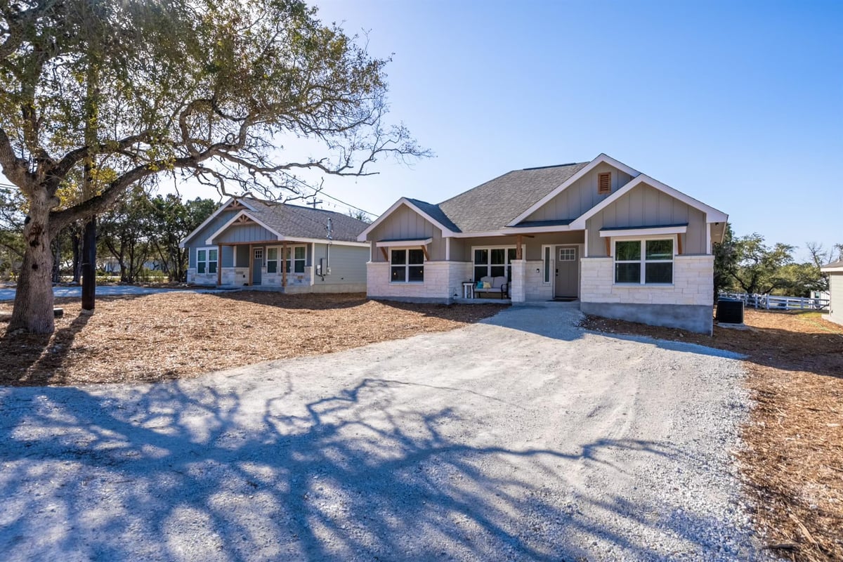 View 117 Lightning Bolt in Cypress Cove 3 117 Lightning Bolt - front exterior - Luxury home in Cypress Cove 3, Spring Branch, TX