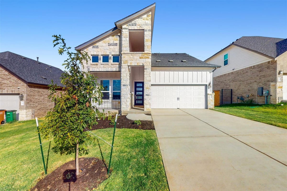View 11701 Dillon Falls Dr in Cascades at Onion Creek 11701 Dillon Falls Dr - front exterior - Luxury home in Cascades at Onion Creek, Austin, TX