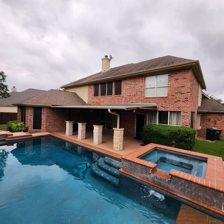 View 11710 Uplands Ridge DR in Uplands Ridge 11710 Uplands Ridge DR - pool area with backyard pool and spa - Luxury home in Uplands Ridge, Austin, TX