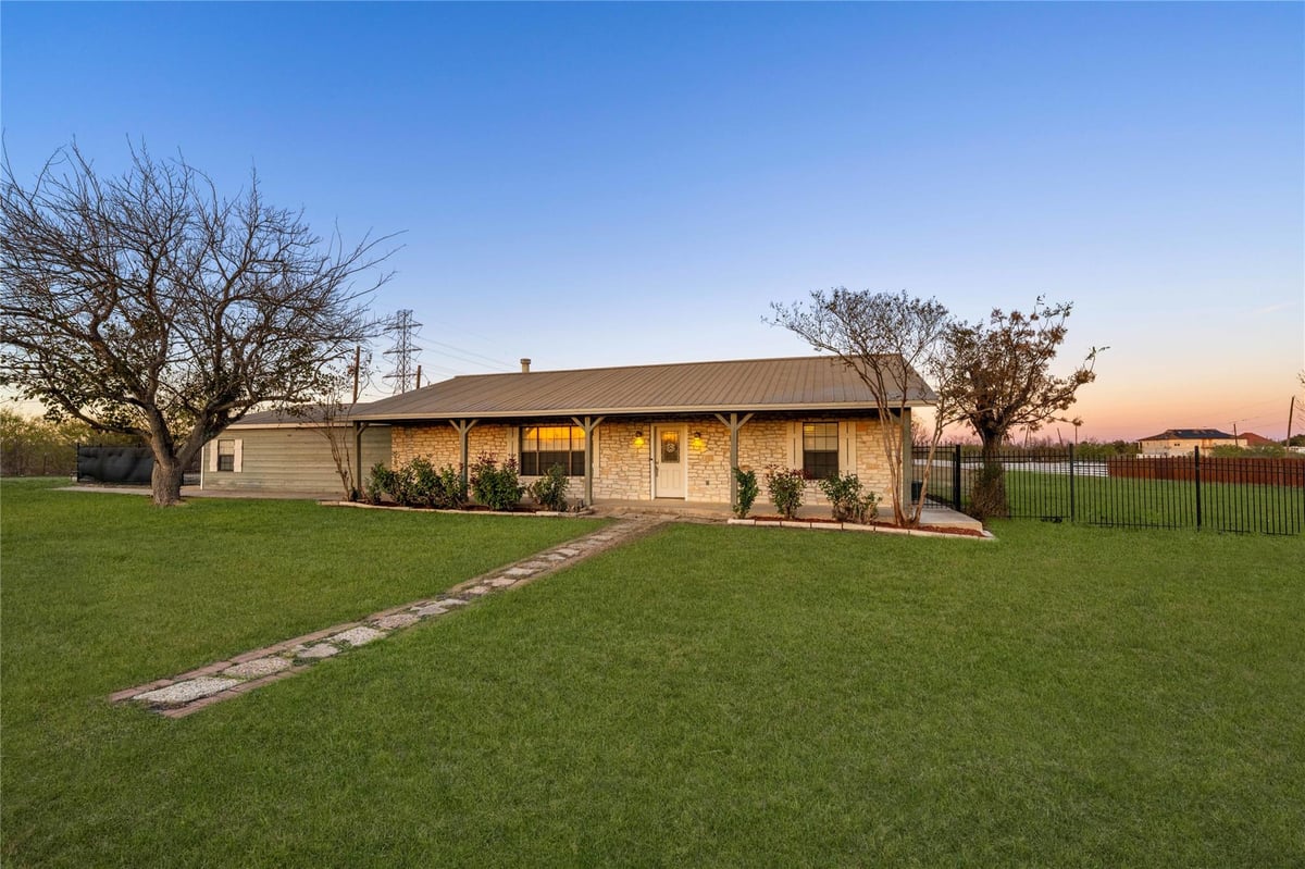 View 11712 Foley Dr in Good Land Farms 11712 Foley Dr - property photo 1 - Luxury home in Good Land Farms, Del Valle, TX