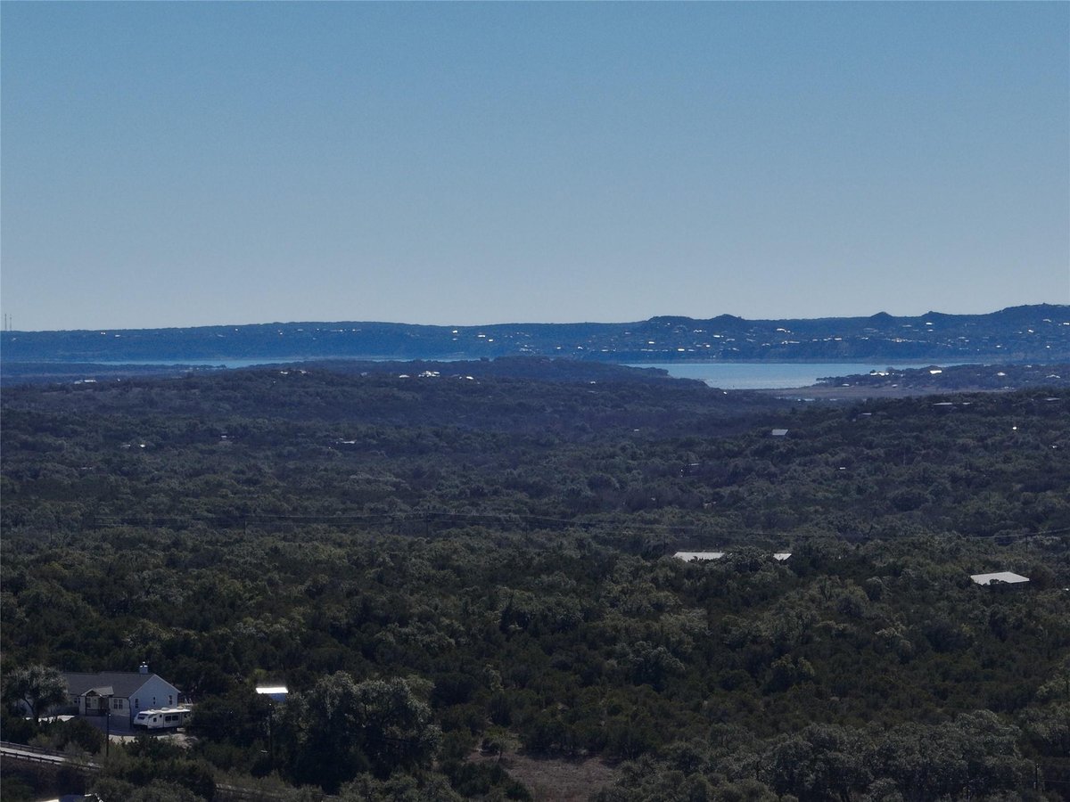 View 1178 Primrose Path in Summit North Ph 5 1178 Primrose Path - front exterior - Luxury lot in Summit North Ph 5, Canyon Lake, TX