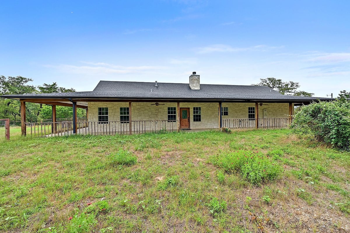 View 11791 Silver Springs RD in Silver Spgs Ranches 11791 Silver Springs RD - front exterior - Luxury home in Silver Spgs Ranches, Rockdale, TX