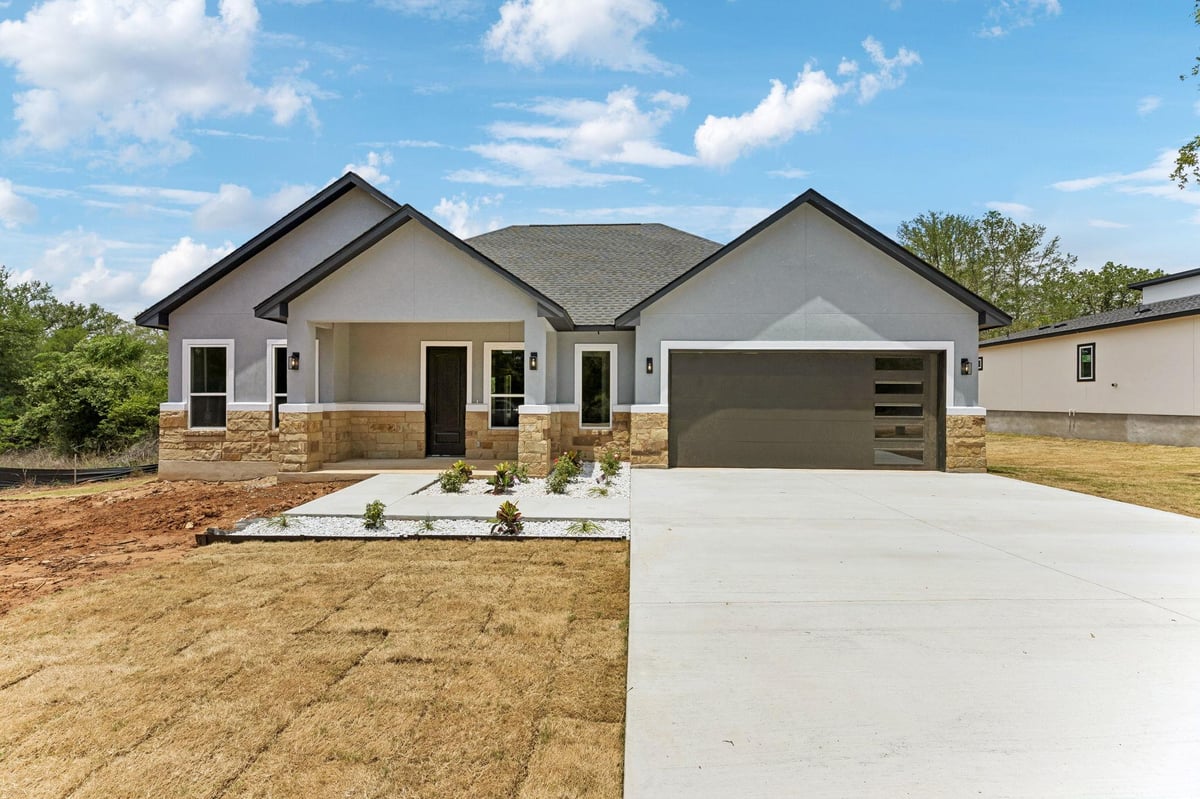 View 118 Heleakala DR in Tahitian Village, 118 Heleakala DR - front exterior - Luxury home in Tahitian Village,, Bastrop, TX