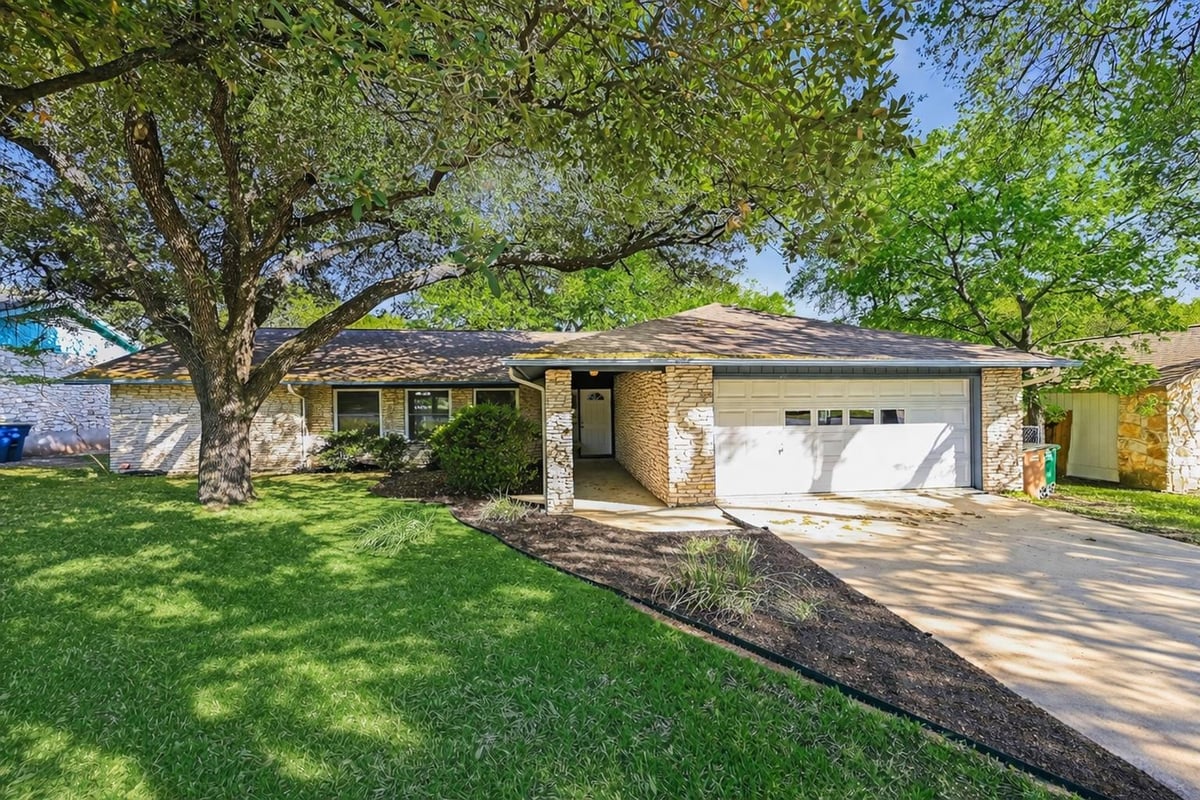View 11803 Broad Oaks DR in Oak Forest Sec 01 11803 Broad Oaks DR - property photo 1 - Luxury home in Oak Forest Sec 01, Austin, TX