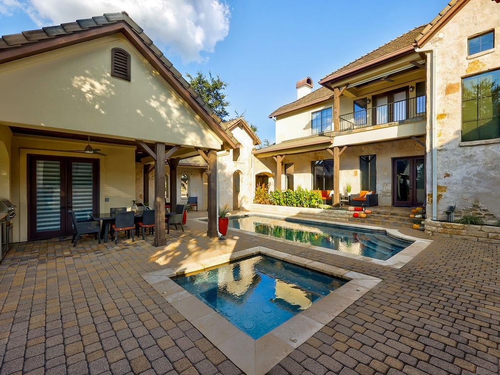 View 11805 Pleasant Panorama Vw in Lake Pointe Sec 07 11805 Pleasant Panorama Vw - pool area with private courtyard pool - Luxury home in Lake Pointe Sec 07, Austin, TX