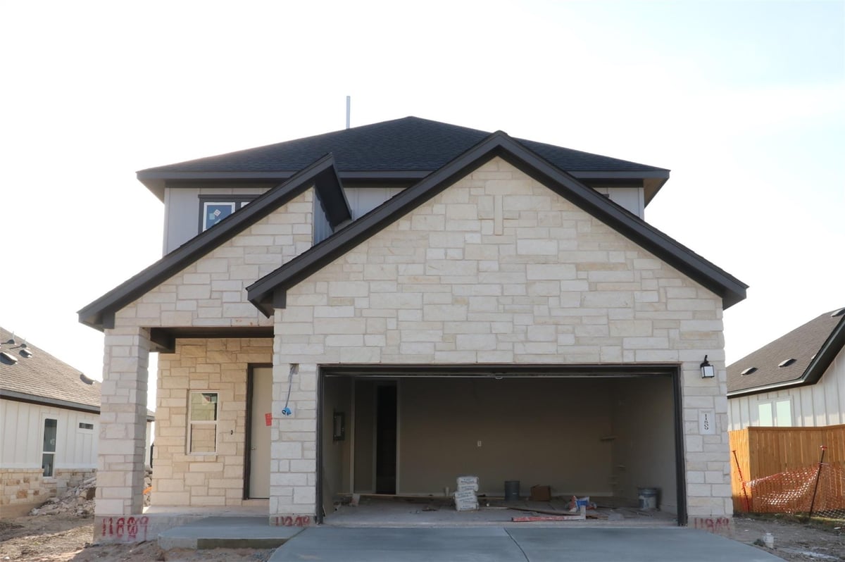 View 11809 Hurricane Haze Dr in Cascades at Onion Creek 11809 Hurricane Haze Dr - front exterior - Luxury home in Cascades at Onion Creek, Austin, TX