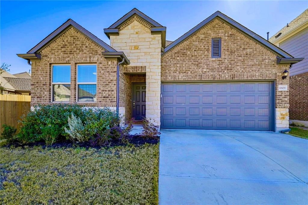 View 11809 Offaly Dr in BELLINGHAM MEADOWS 11809 Offaly Dr - front exterior - Luxury home in BELLINGHAM MEADOWS, Austin, TX