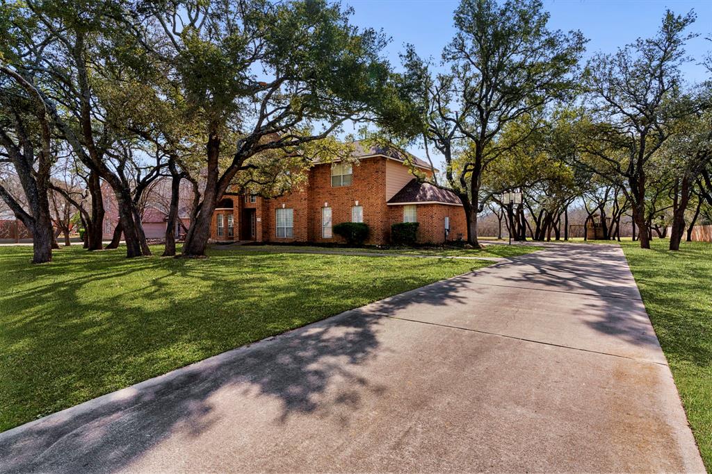 View 11809 Onion Hollow Run in SOUTHLAND OAKS SEC 2 11809 Onion Hollow Run - front exterior - Luxury home in SOUTHLAND OAKS SEC 2, Austin, TX