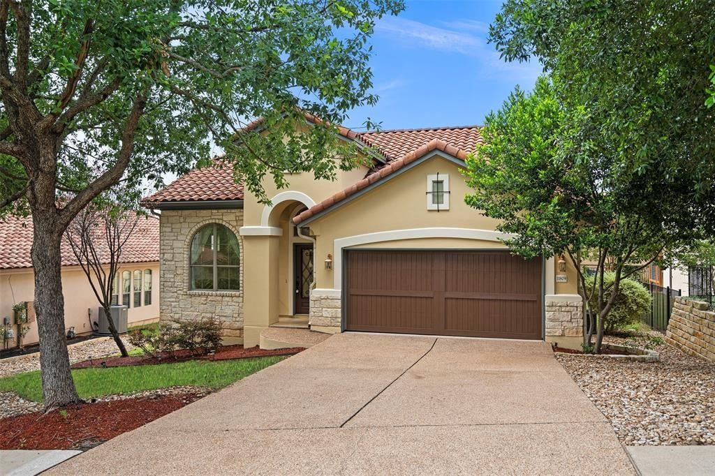 View 11809 Woodland Hills Trl in Steiner Ranch Ph 01 Sec 10a 11809 Woodland Hills Trl - front exterior - Luxury home in Steiner Ranch Ph 01 Sec 10a, Austin, TX