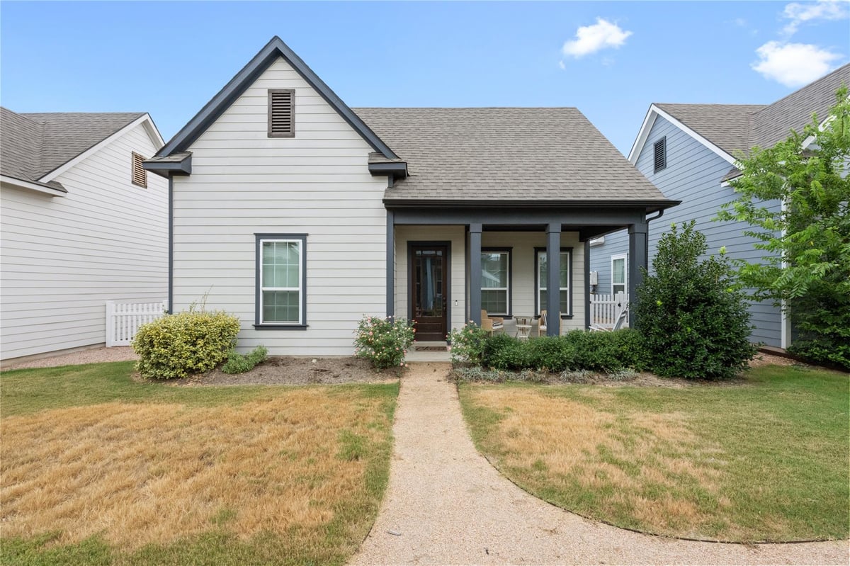 1182 Grant Wood Ave - front exterior - Luxury home in The Gardens Of Howard Ranch, A Residential Condo, Driftwood, TX