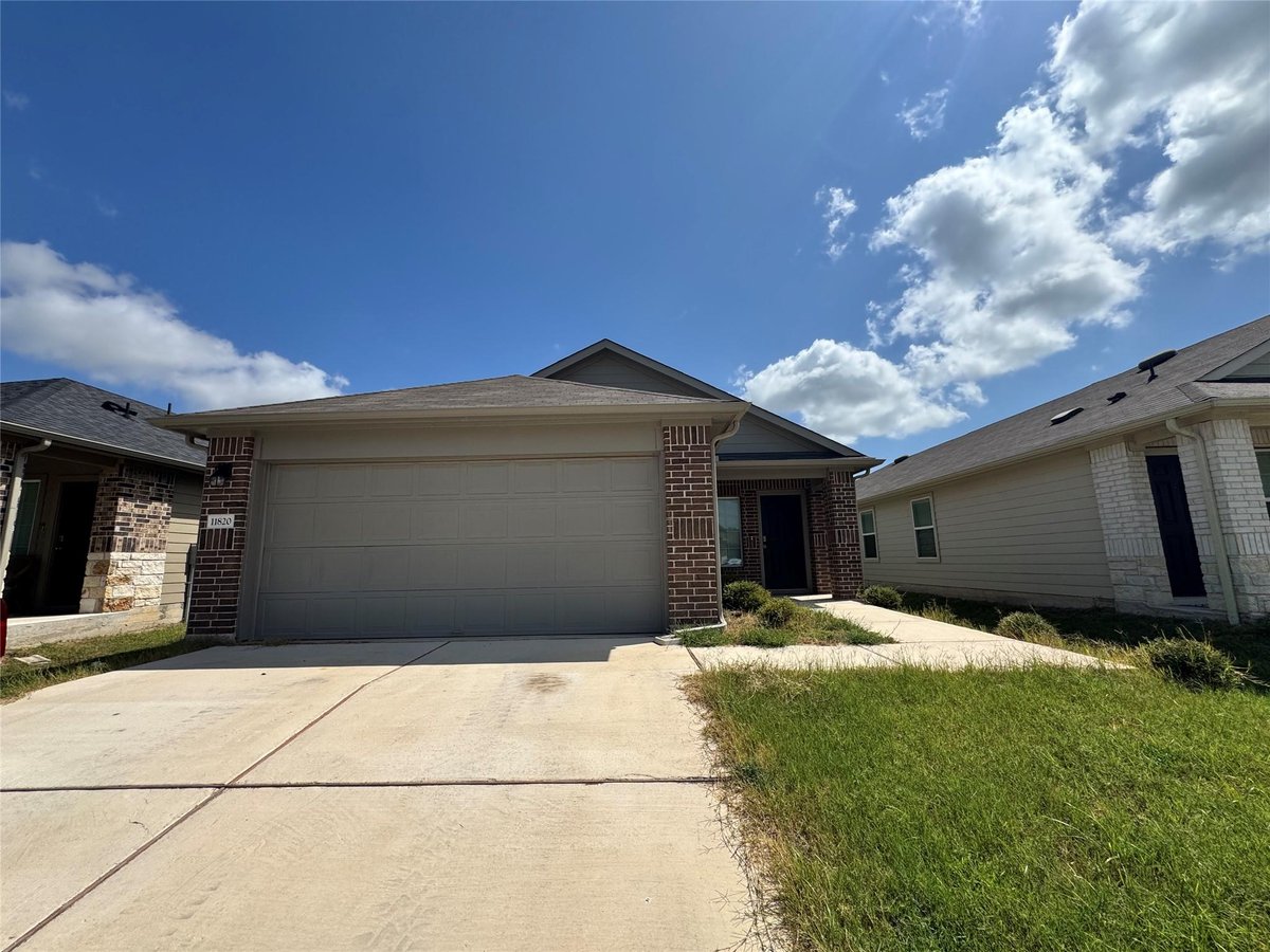 View 11820 Rush LN in PEPPERGRASS 11820 Rush LN - front exterior - Luxury home in PEPPERGRASS, Elgin, TX