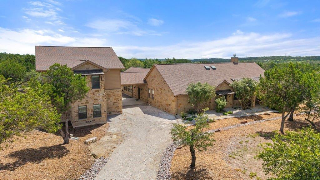 View 11842 Rim Rock TRL in Rim Rock Subdivision 11842 Rim Rock TRL - front exterior - Luxury home in Rim Rock Subdivision, Austin, TX